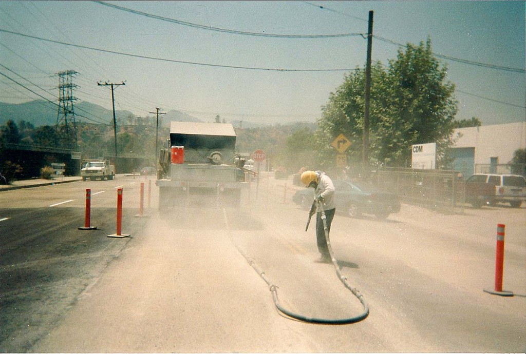 Sandblasting lines from road